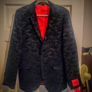 Hugo Boss men's 38 regular brand new with tags currently in stores! Selling for